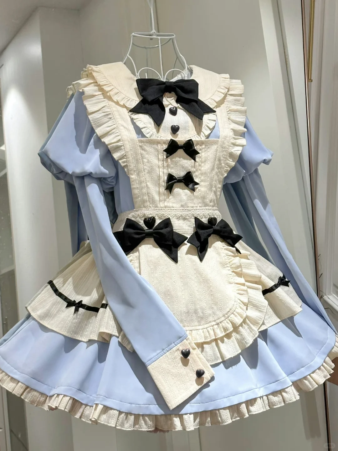 Charming Light Blue and Cream Maid Dress with Black Bow Accents and Heart Buttons